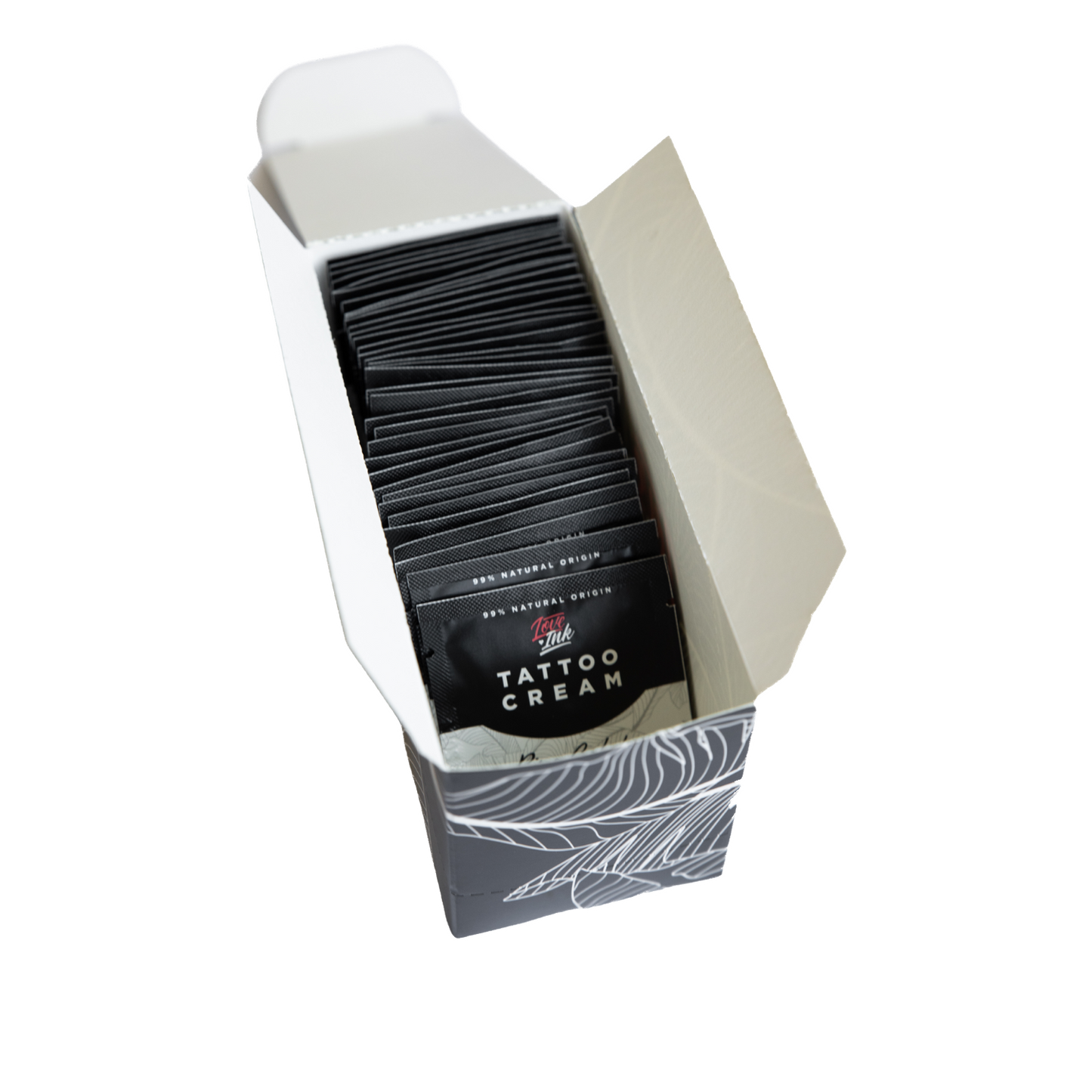 Vzorci kreme za tetoviranje v majhni škatlici
